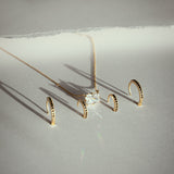 10k Solid Gold Black CZ Huggies -  - Earrings - Ofina